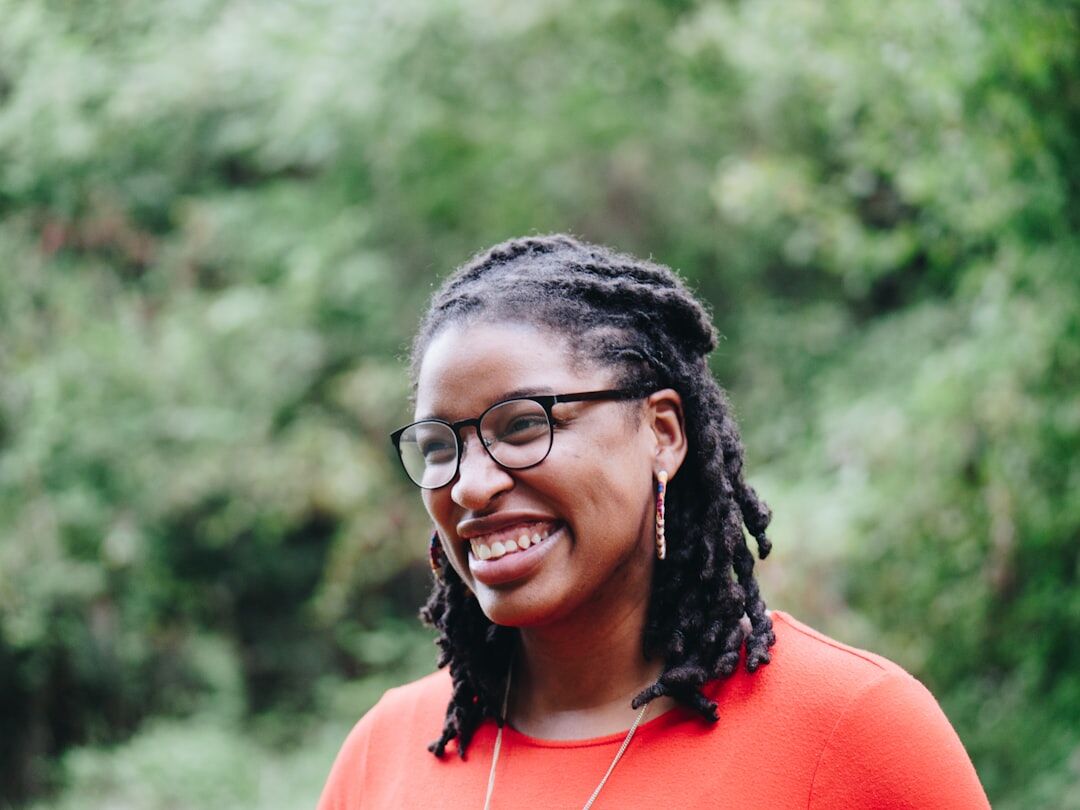 african woman entrepreneur smiling