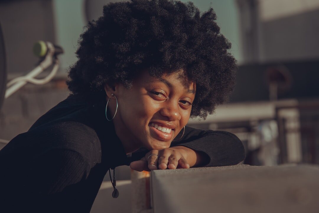 african woman entrepreneur smiling